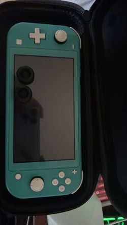 Nintendo switch lite turquoise with 2 games