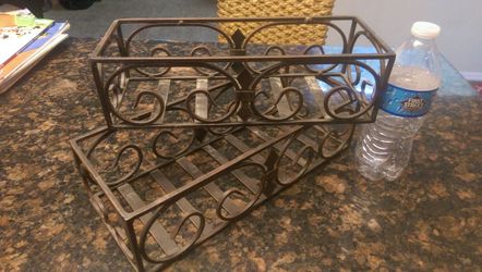 3 for $20.00 - Iron utility shelves/organizer.