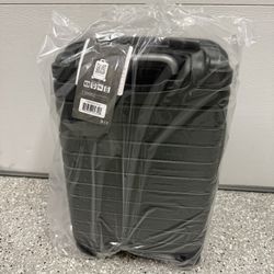 Travelers Choice 21 Inch Spinner Carry On Suitcase