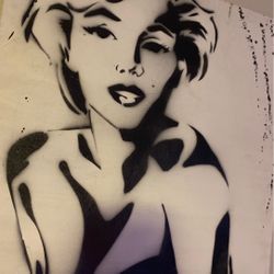 Paintings $200black and white one and $50 Each of the pink ones