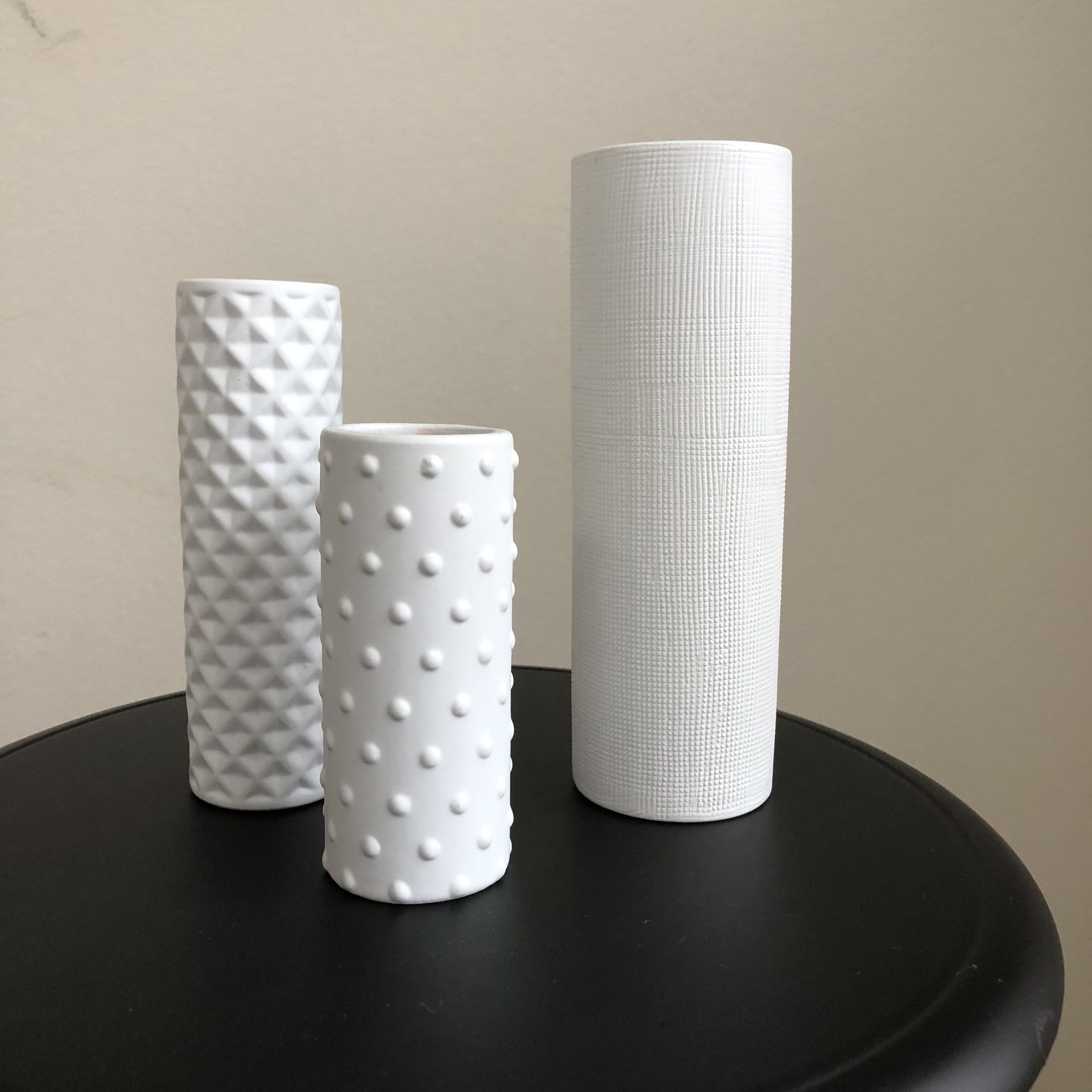 A set of CB2 decorative white vases