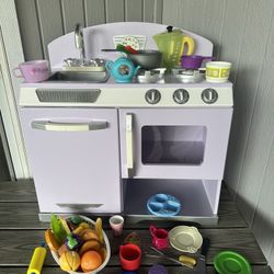 Wooden kids kitchen food and dishes 