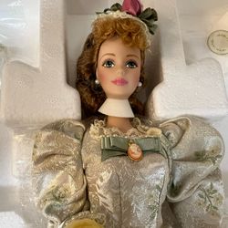 1998 Limited Edition Mint Memories Porcelain Barbie from the Victorian Tea Porcelain Collection.  It is the first doll in the series.  The doll is mad