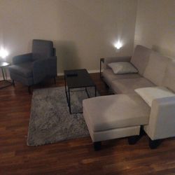 Chair With Ottoman Couch With Chaise Two End Tables And Coffee Table.