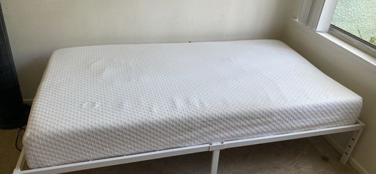 Two twin beds and frames.