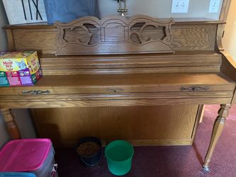 Upright Console Piano in Oak Finish