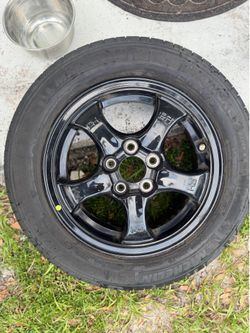 4 GREAT SHAPE MICHELIN TIRES 205/6OR16  AND RIMS 5 LUG PATTERN