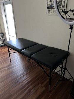 Massage/tattoo bed