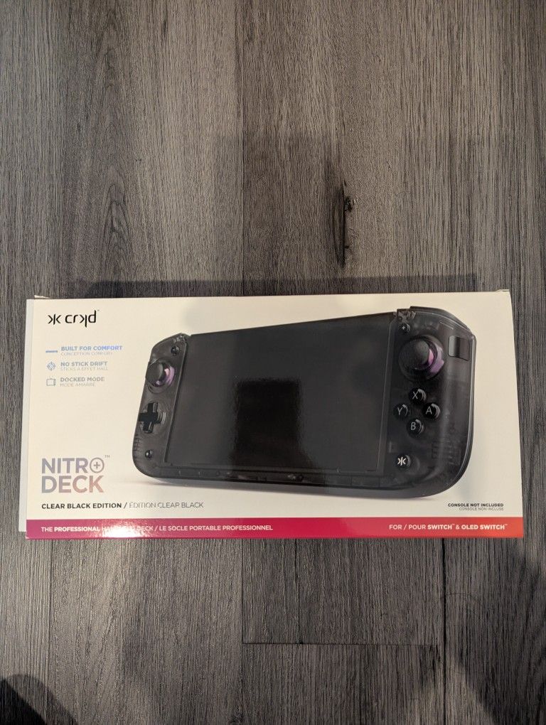 CRKD Nitro Deck+ Handheld Nintendo Switch Controller - Clear Black Edition