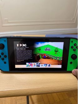 Nintendo Switch in good condition, fully functional, with 8 games.