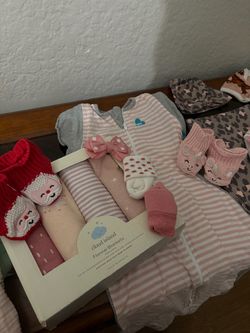 Bag of new/barley used baby girl clothes