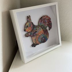 home decor squirrel puzzle and a display box