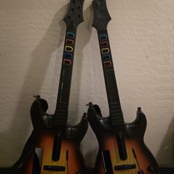 Two Guitar Hero Sunburst Guitars for the Nintendo Wii Console 