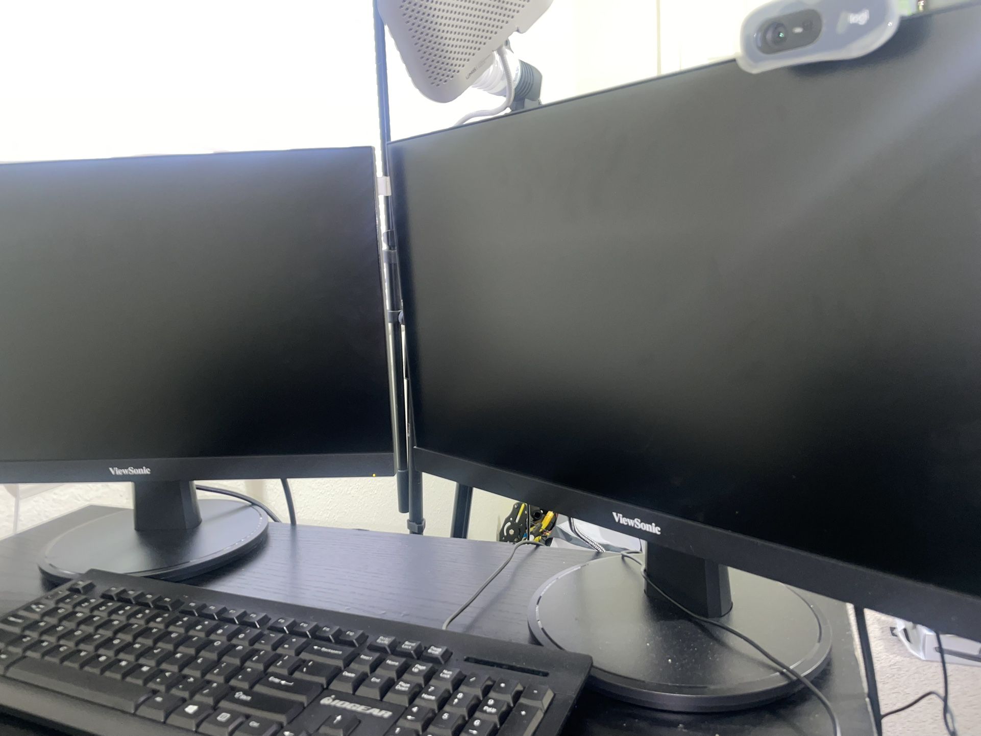 2 Viewsonic 22” Monitors (VA2247-MH) with 1 Keyboard, 2 noise canceling headsets, and 1 webcam