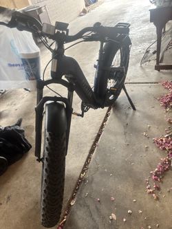 Aventon Aventure step-through electric fat tire bike in a dark blue color