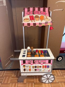 Melissa and Doug ice cream/hotdog cart toy