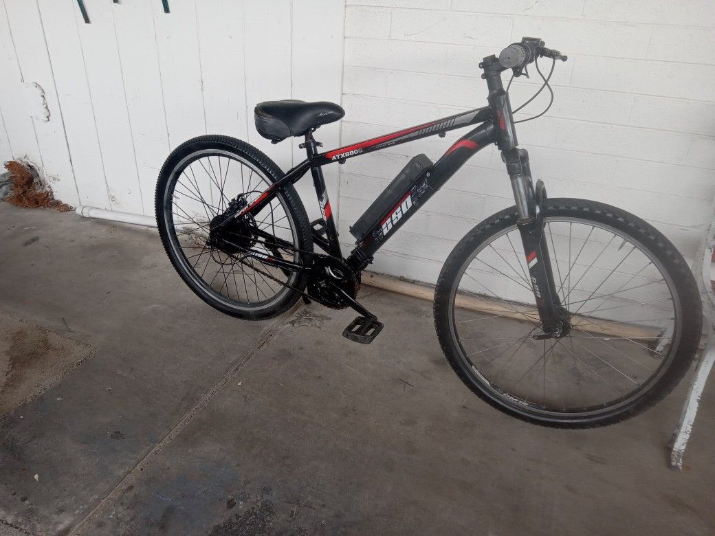 Electric bike goes fast with charger 250 $