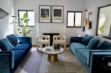 Rove Concepts - 2 Blue Velvet Couches + CB2 seat + Rug