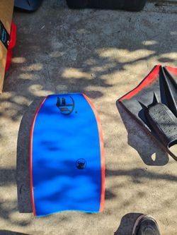 Tiny mini bodyboard and fins