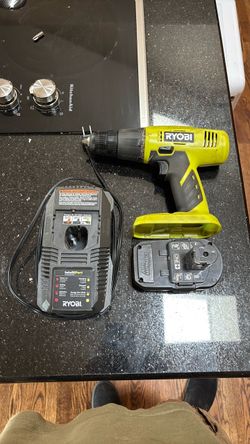Ryobi drill with charger and battery