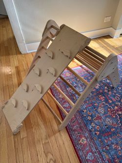 Kids climbing triangle wood