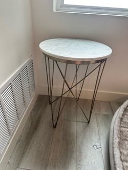 Like new marble top side table