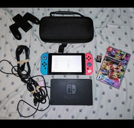 Nintendo switch bundle with brand new joycons. 2 games and 64gb Microsd card.