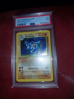 First edition holo machamp  psa 7