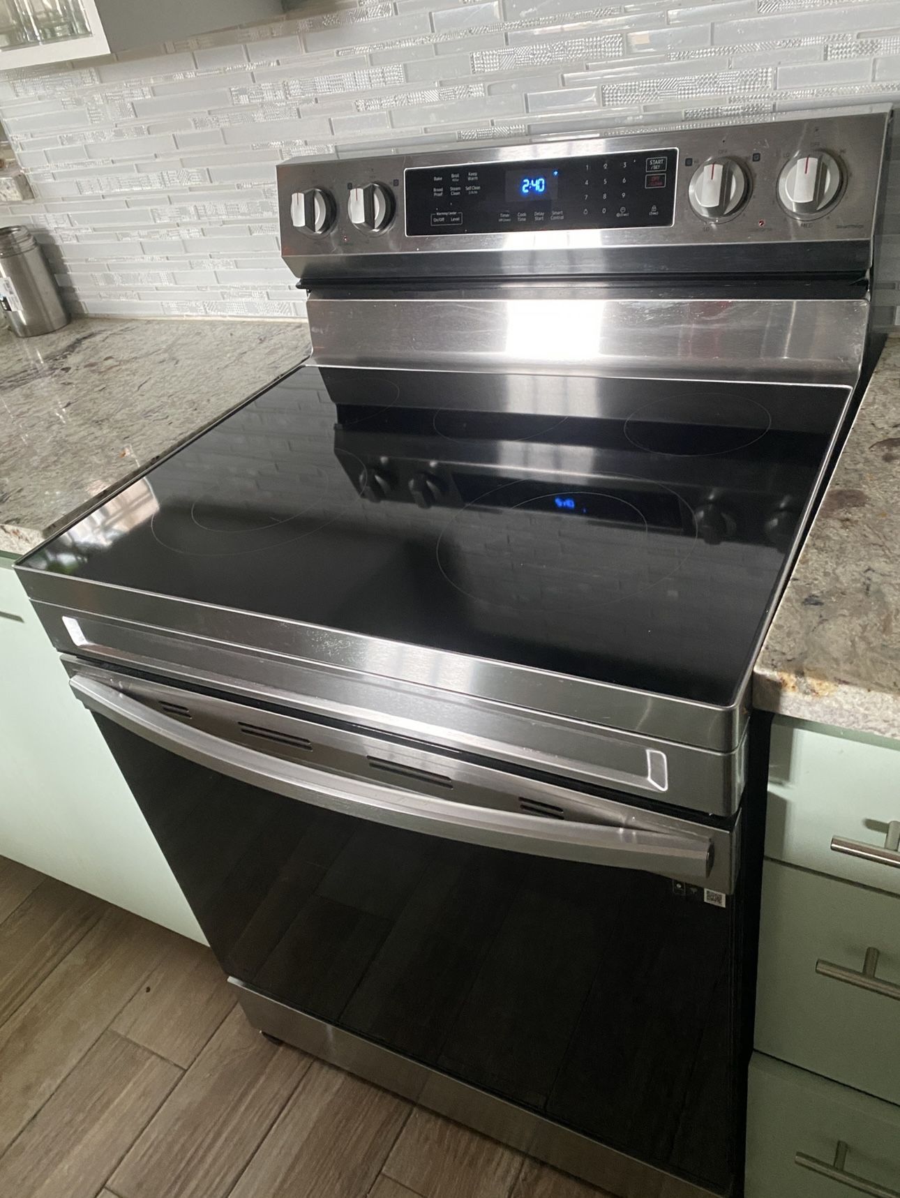 6.3 cu.ft. 5 Burner Element Smart Freestanding Electric Range with Rapid Boil and Self Clean in Stainless Steel