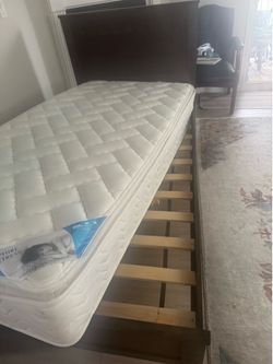Twin bed (pillow top mattress)