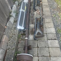 Free Metal! Boat Axle, Dodge Ram Grill/Rear bumper. Free Tires