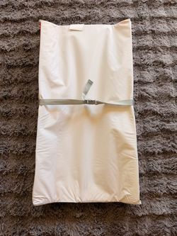 Diaper changing pad with 2 covers