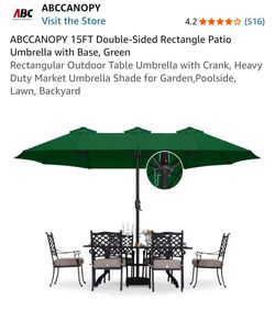 15 ft umbrella with stand.  Open box.  Never used.