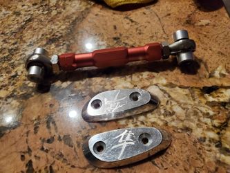 Hayabusa lowering link brand new never used and the block of plates are used