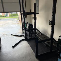 Weight bench + rack + barbell + steel plates
