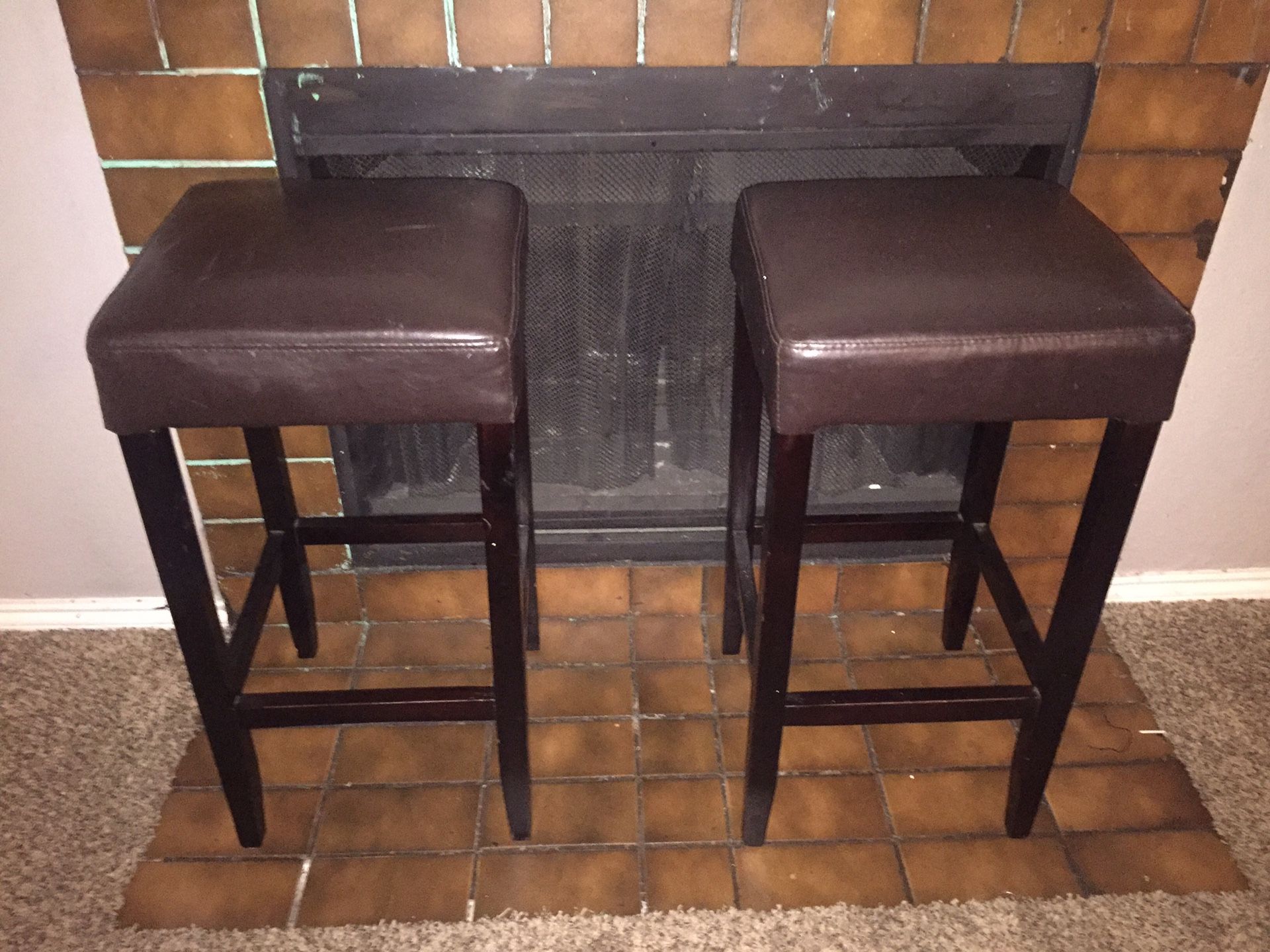 Leather stools for bar area or lounge areas and I’ll throw in the light up hello sign