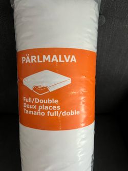 IKEA PÄRLMALVA mattress protector in a full size, packaged in white plastic