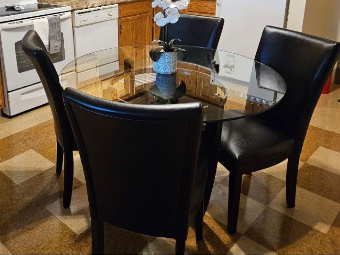 GLASS TABLE AND CHAIRS
