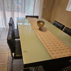 Elegant Glass On The Top Dining Table With 6 Leather Chair 