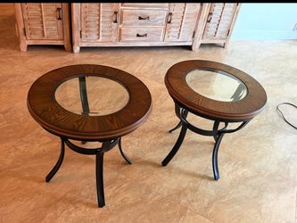 2 wood /black rod iron round tables in great condition