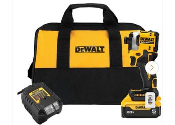 BRAND NEW IN BOX DEWALT IMPACT DRILL  WITH 5AH BATTERY AND CHARGER