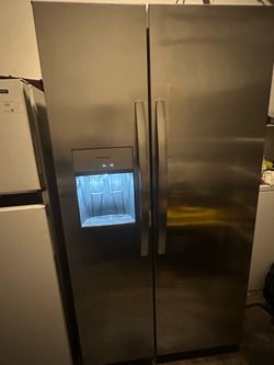 Frigidaire side-by-side stainless steel refrigerator 36 wide 33 deep 70 tall