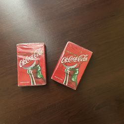 2 Plastic Coated Coca Cola Card Packs