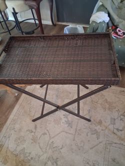 Antique wicker table