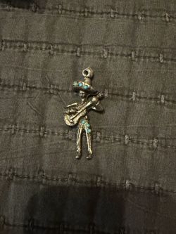 Metal musician pendant