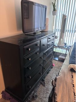 Black dresser with 9 drawers
