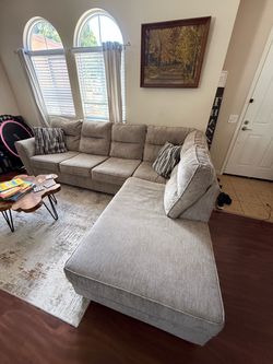 Benchcraft Olten 2-Piece Sectional with Chaise – Mocha