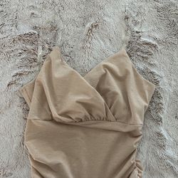 tan going out top