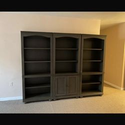 Set of three solid wood vertical bookshelves 