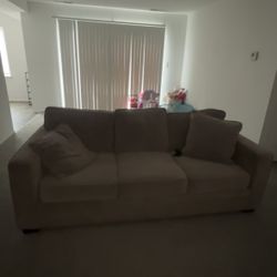Brownish Grey Three Seater Couch